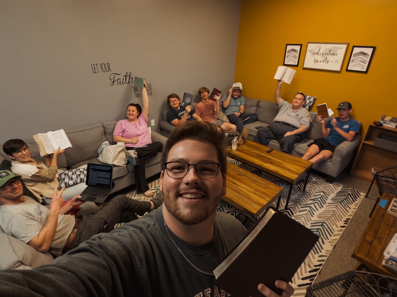 Dylan with a group in a youth room