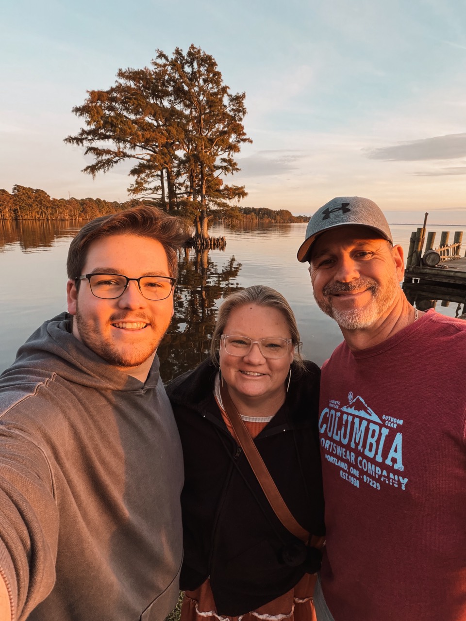 Dylan with family by the water